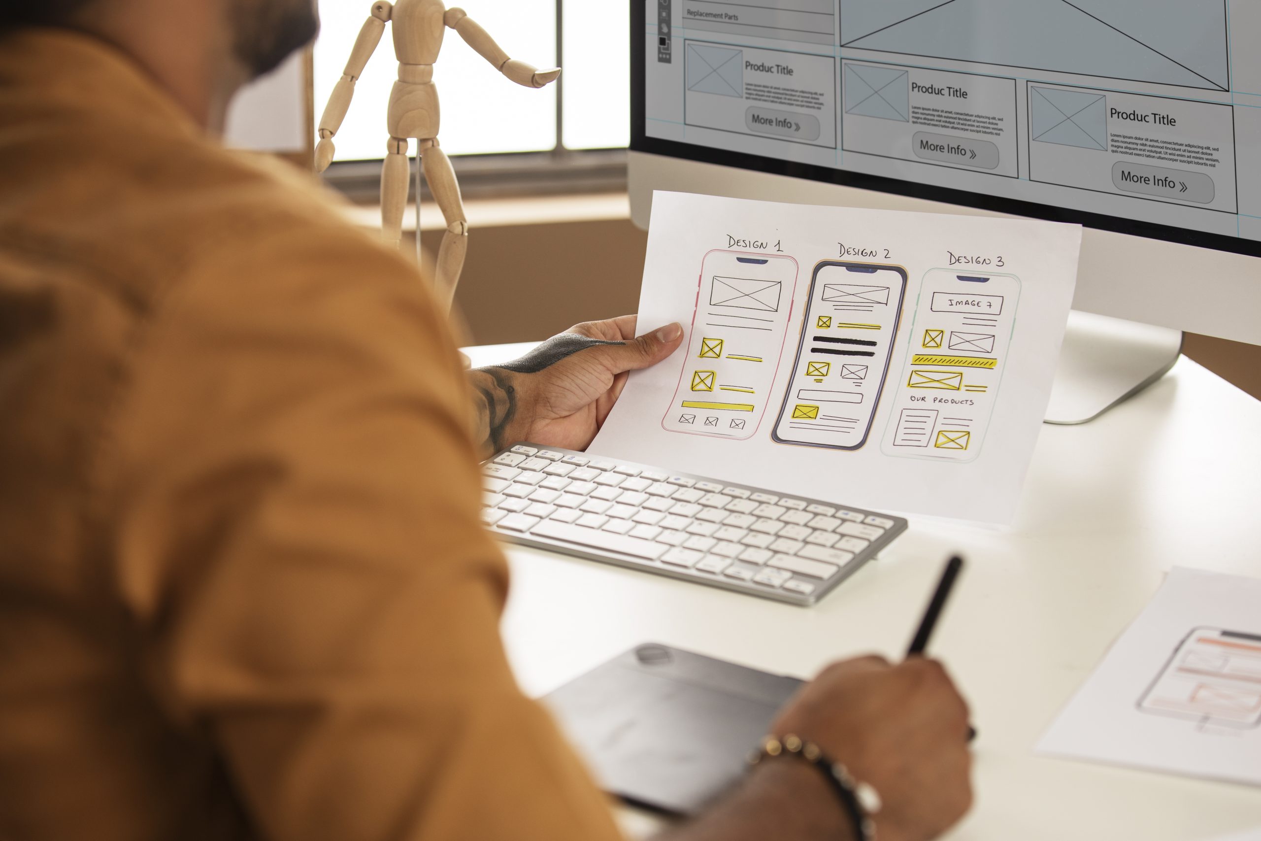 Figma interface next to a coded website layout on desktop and mobile